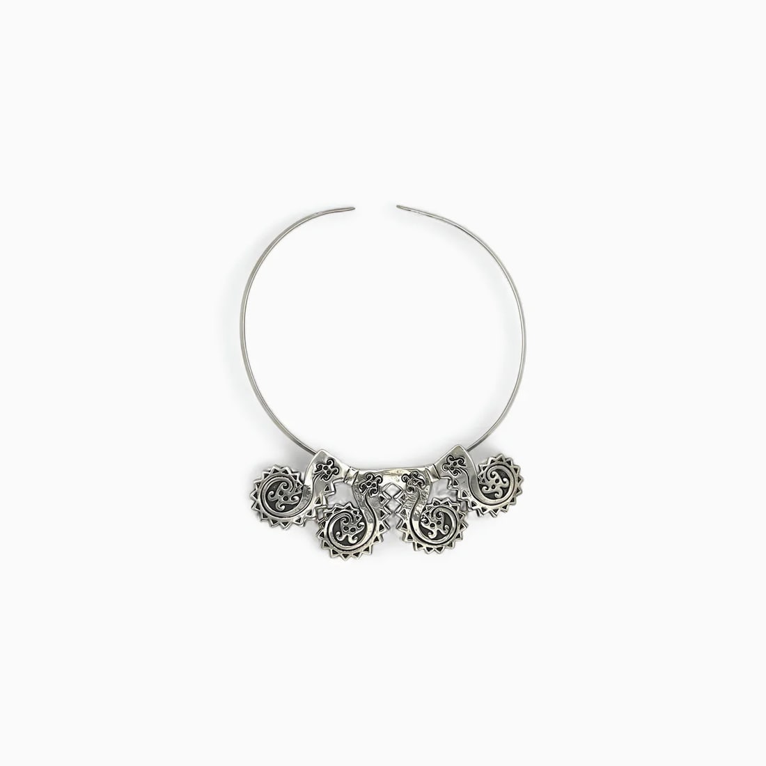 "Octopus Collar" Necklace: This bold statement necklace by Ciec-Sipán evokes the mystical beauty of the ocean through its powerful, ornamental design. Five stylized octopuses—each intricately sculpted in sterling silver—fo