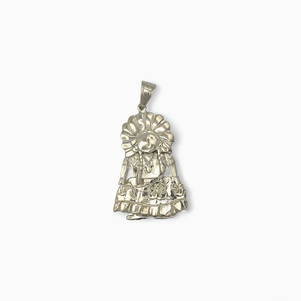 "Tehuana" Mexican Pendant: The Tehuana Pendant by Oro de Monte Albán pays tribute to one of Mexico’s most iconic cultural symbols—the women of the Isthmus of Tehuantepec. Rendered in detailed sterling silver, the figure we