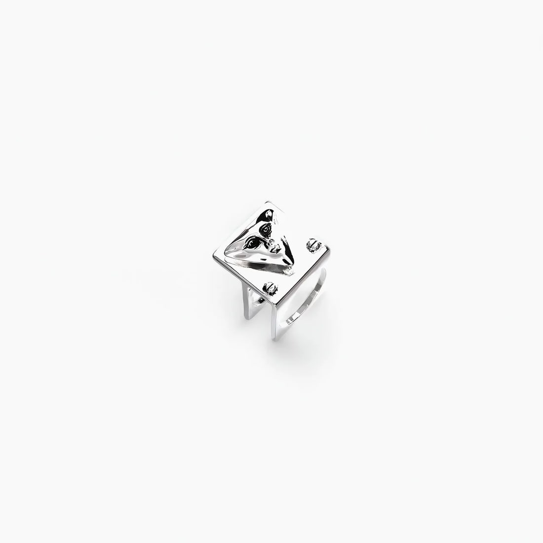 "Watcher of Luxor: The Pyramid Face" Jewelry Ring: Angular and enigmatic, Watcher of Luxor draws on ancient geometry and surrealist portraiture. At its center is a raised triangular face—part deity, part guardian—encased in a solid square bezel th