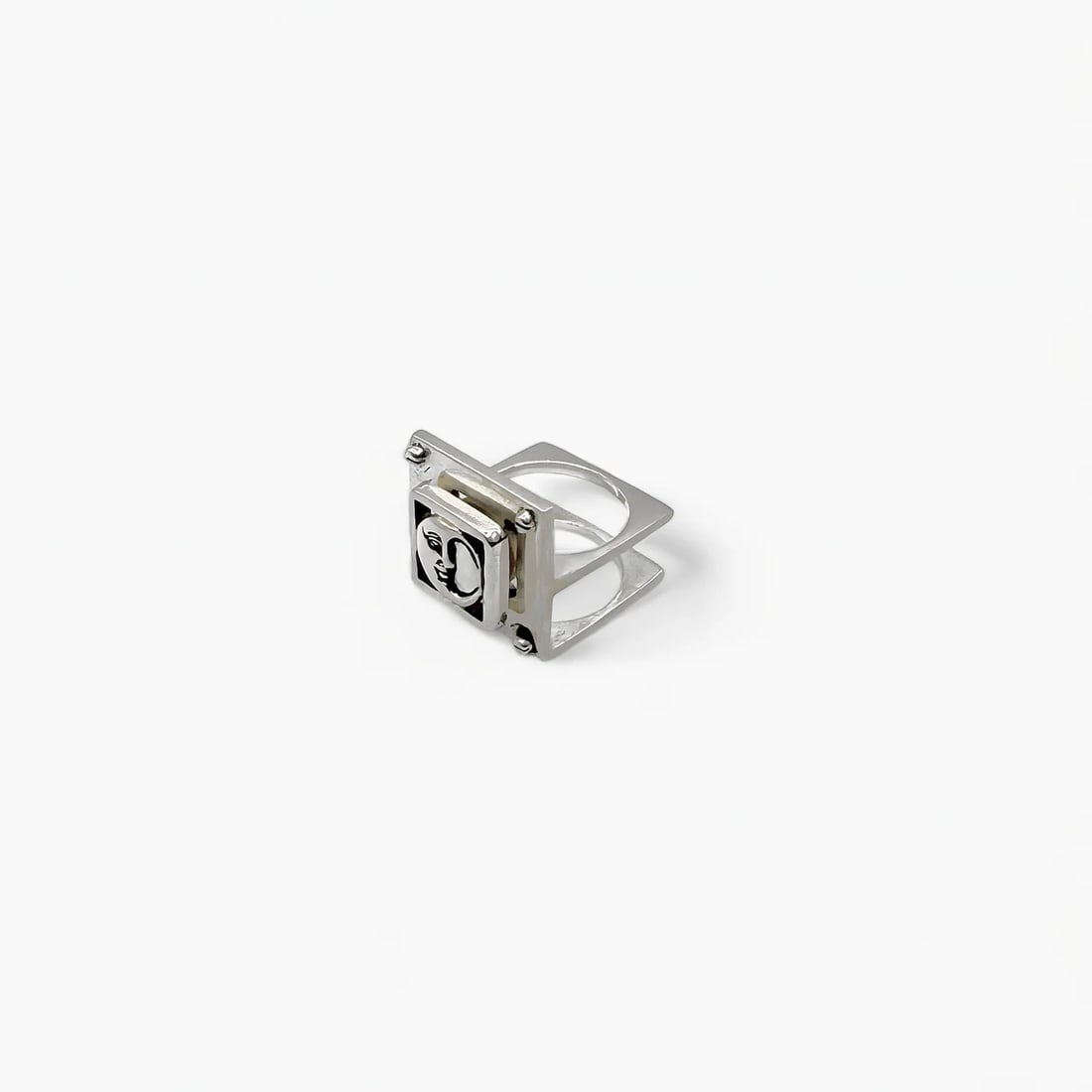 "Moonlocked: The Nile Mechanica" Jewelry Ring: Boldly geometric and symbolically rich, Moonlocked is a ring that feels both ancient and futuristic. At its core is a sculpted moon face, framed by a precision-engineered square structure that evokes 