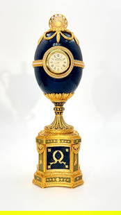 Vivian Alexander "Faberge Chanticleer Clock": Handcrafted in 1999 | Original Retail: $9,375. A timeless piece from the Vivian Alexander Forbes Chanticleer Collection. This special Forbes Collection series portrays the dazzling French neo-classica
