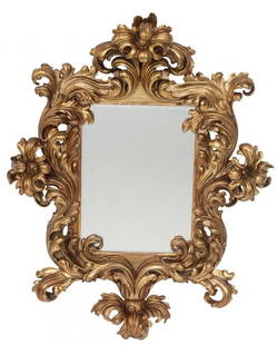 An Italian Rococo-Style Carved Gilt Wood Mirror: An Italian Rococo-Style Carved Gilt Wood Mirror measures 65 x 51 x 11 inches