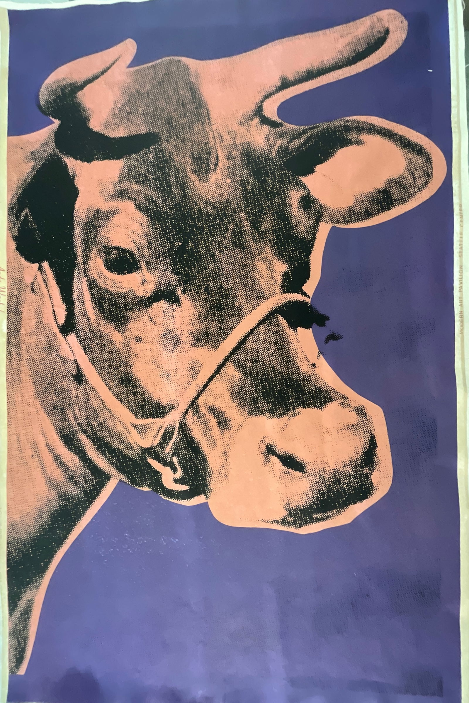 Andy Warhol (1928-1987) Purple Cow Lithograph Hand Signed After: Andy Warhol (1928-1987) Purple Cow Hand Signed Lithograph. Measures: 45 x 29 inches, mounted to linen backing. Andy Warhol was an American visual artist, film director and producer. A leading figure i