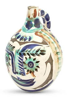 Pablo Picasso VISAGE AUX YEUX RIEURS: Pablo Picasso (1881-1973) VISAGE AUX YEUX RIEURS (ALAIN RAMIÉ 608), ceramic pitcher, 1969, numbered 4/350, incised Edition Picasso and Madoura and with the Madoura Plein Feu and Edition Picasso potte