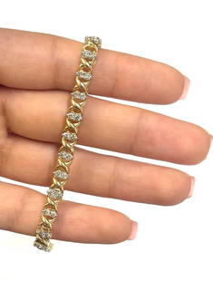 2.5 Ct Gold X-O Diamond Bracelet: Lovely bracelet with 2.5 carats of natural diamonds. Crafted in solid 10K gold. 7.5 inches in length. Finely handcrafted. Hand-set diamonds for lasting brilliance.