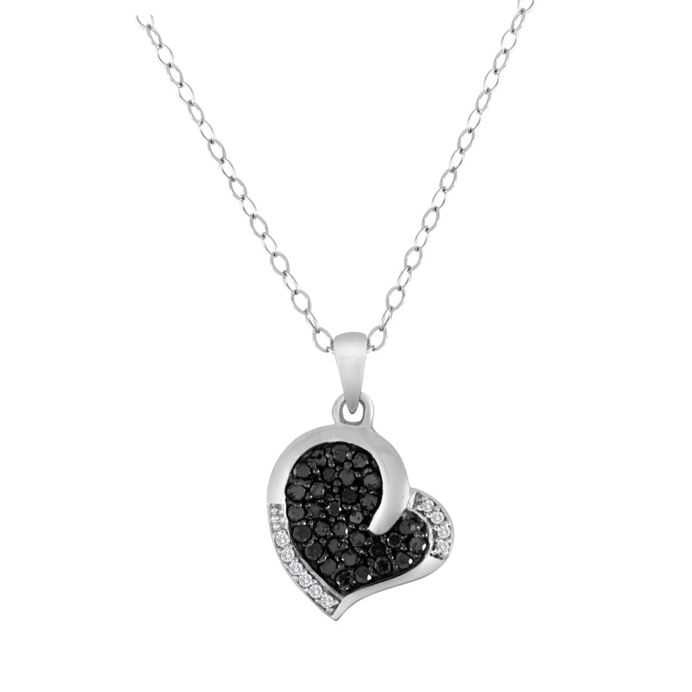 Black & White Diamond Heart Pendant In Sterling Silver: Heart-shaped pendant crafted in sterling silver. Set with 0.53 carats (53 points) of natural black and white diamonds. Beautiful contrast between black and white stones for striking appeal. Sold in la