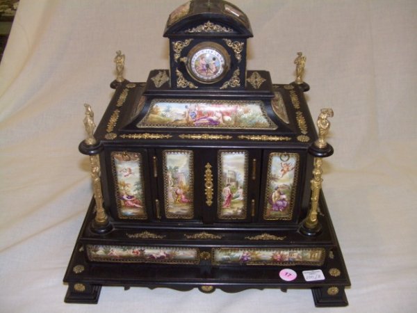 stunning hand painted jewelry box with clock bronze: figures Sevres Porcelain quality on the painting very nice dresser box, each scene is very well done, with putti's, satyr's, childern, ladies, nudes angels and more. maker unknown. bronze cast figures