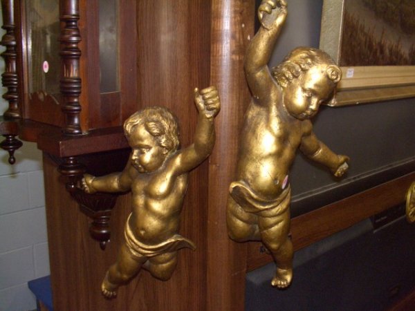 2 piece Italian hand carved putti's: with a gold wash paint cond good. age crack in wood see photo's 17 1/2 with hook in back to hang on wall