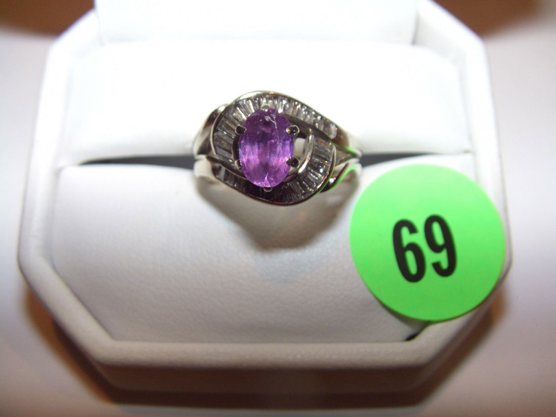 outstanding vintage diamond and rare pink sapphire: outstanding vintage diamond and rare pink sapphire ring set in platinum