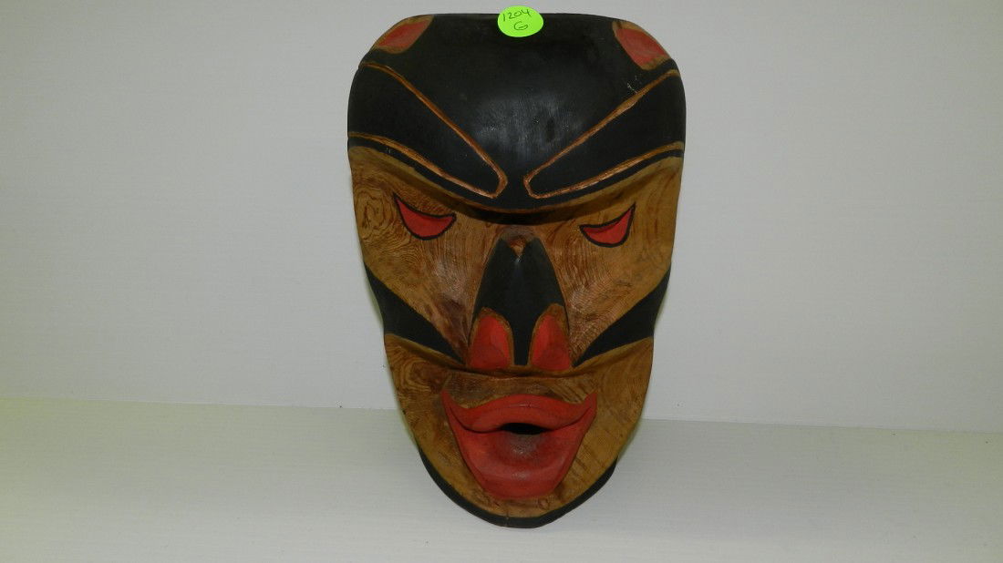 hand carved and painted Native American mask by: hand carved and painted Native American mask by Calvin Hunt (Kwakiutl) "Wild Woman"