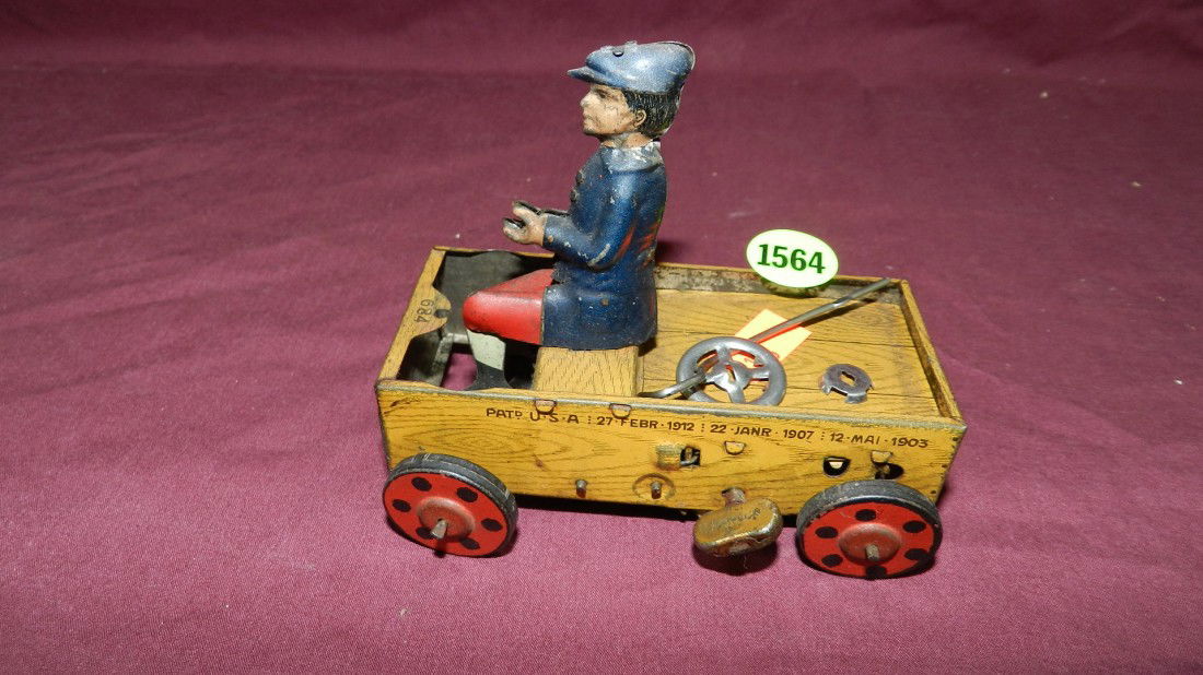 1920s STRAUSS LEHMANN TIN WIND UP MAN DRIVING CAR: 1920s STRAUSS LEHMANN TIN WIND UP MAN DRIVING CART TYPE CAR (steering wheel off but there) GERMANY