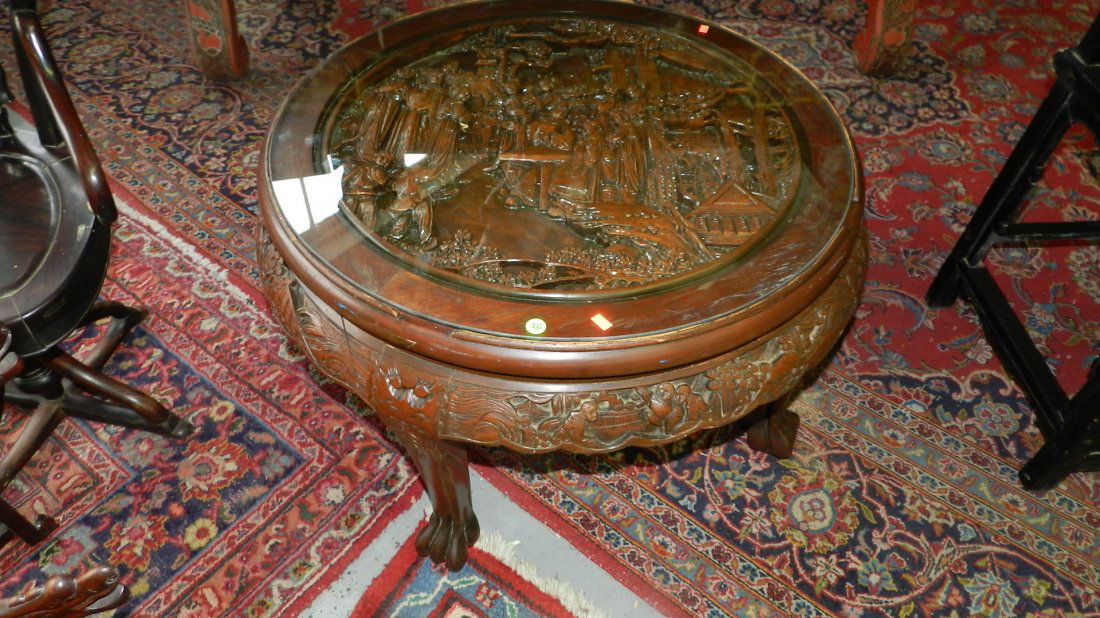 deep carved Asian round coffee table with glass top, te Apr 04, 2013