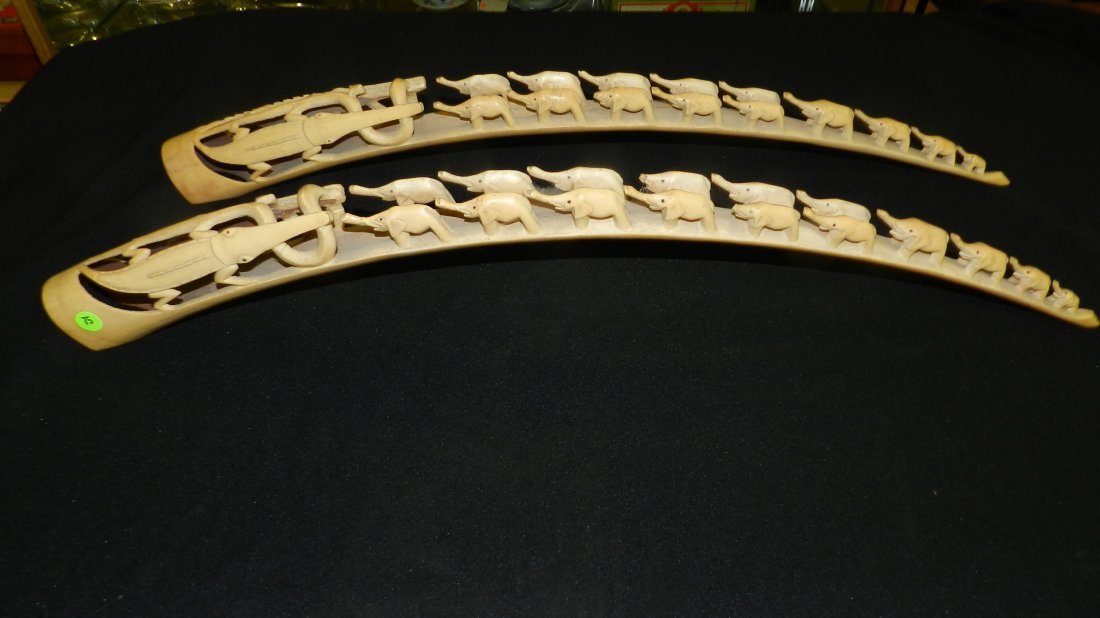 outstanding 2 piece massive matching AFRICAN IVORY TUSK: outstanding 2 piece massive matching AFRICAN IVORY TUSKS-(pre ban) African theme carved tusk depicts elephants - snakes- alligator, as seen, minor loss to elephant, colored due to age, 33" long