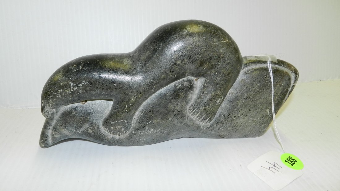 Alaska Inuit, signed Sieamme, large carved Steatite: Alaska Inuit, signed Sieamme, large carved Steatite figure of a reclining otter feeding on fish w/ incised details of claws & facial expression, attributed to Lucas Sieamme. 9 1/2" L.