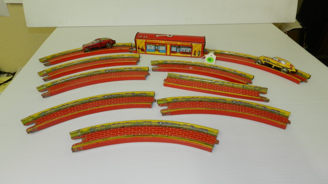 Vintage tin litho toy, by Marx, wind up car, track &: Vintage tin litho toy, by Marx, wind up car, track & tunnel set. Comes with 2 wind up Marx cars.