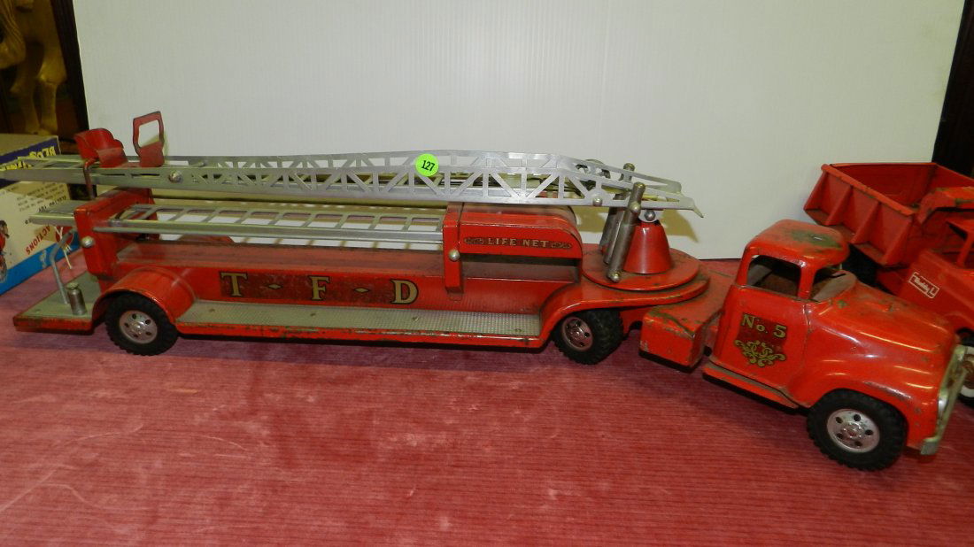 large antique metal toy fire truck / ladder truck
