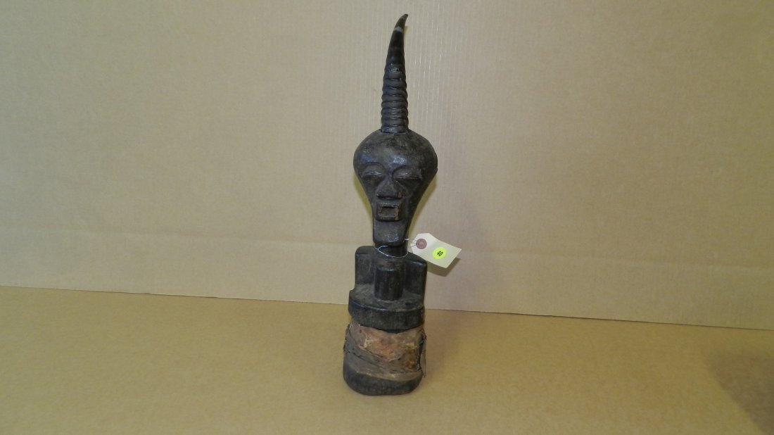 1620) African carved Songye half figure with animal: 1620) African carved Songye half figure with animal horn, loincloth animal hide design, COND G, 18 1/4" Tall