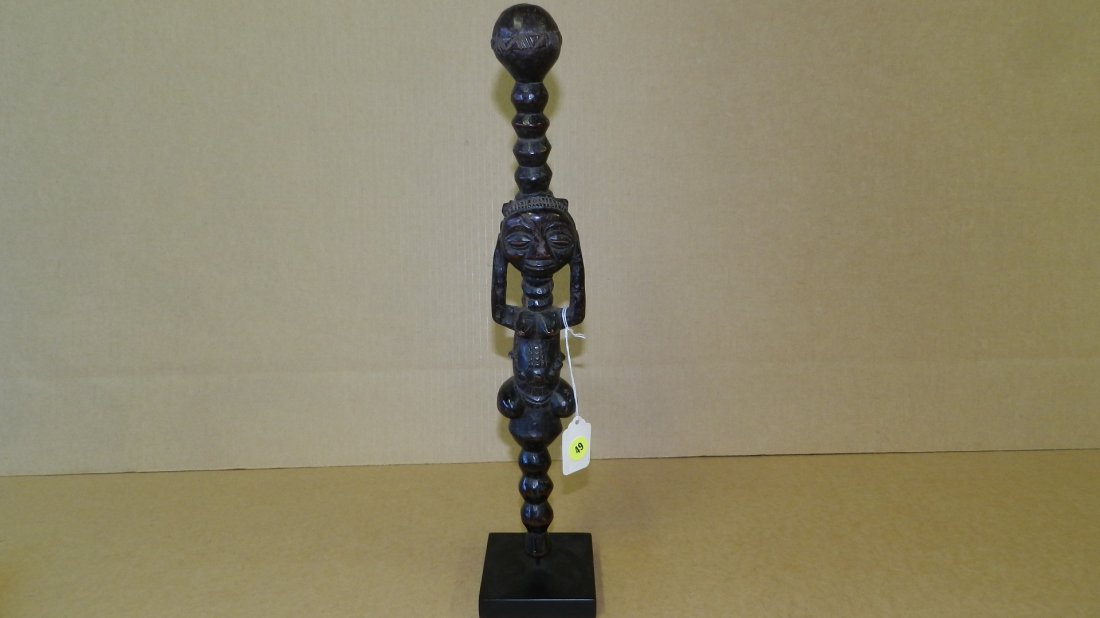 1693) African carved Luba staff with kneeling female: 1693) African carved Luba staff with kneeling female finial, on stand from DR Congo, COND G, 18"