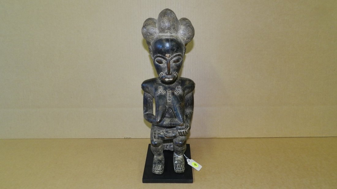 9309) African carved figure, Baule maternity sitting on: 9309) African carved figure, Baule maternity sitting on stool, from Ivory Coast, COND G, 16 1/2"