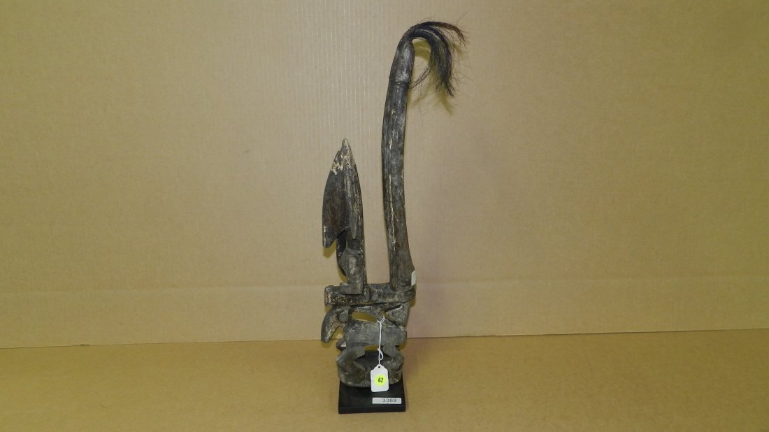 3388) African carved Chiwara mask, on stand, from West: 3388) African carved Chiwara mask, on stand, from West Africa, COND G, 21 1/2"