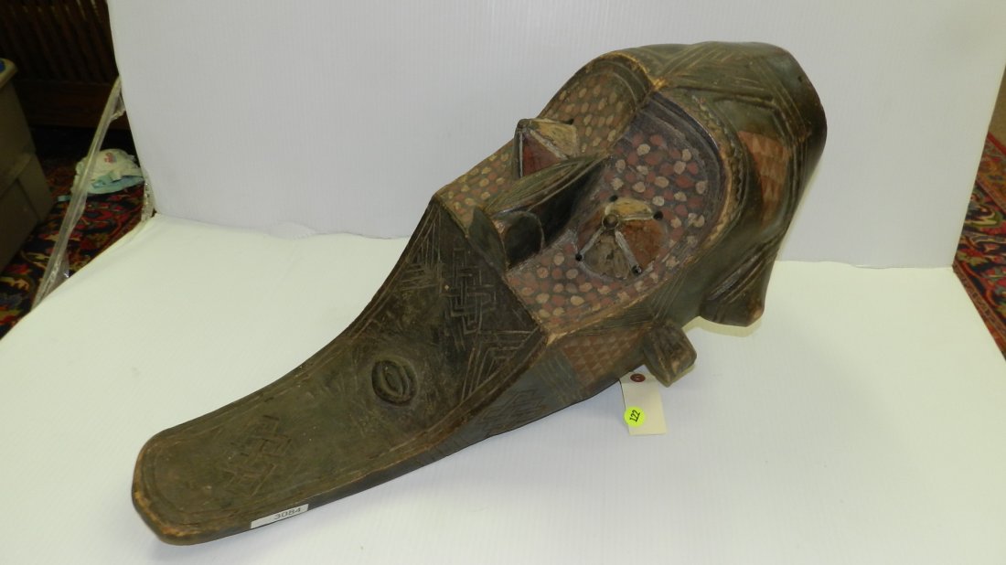 3084) African carved Large mask with conical protruding: 3084) African carved Large mask with conical protruding eyes. Upper part dotted red/white dots, from Central Africa, cond G, 24 x 12