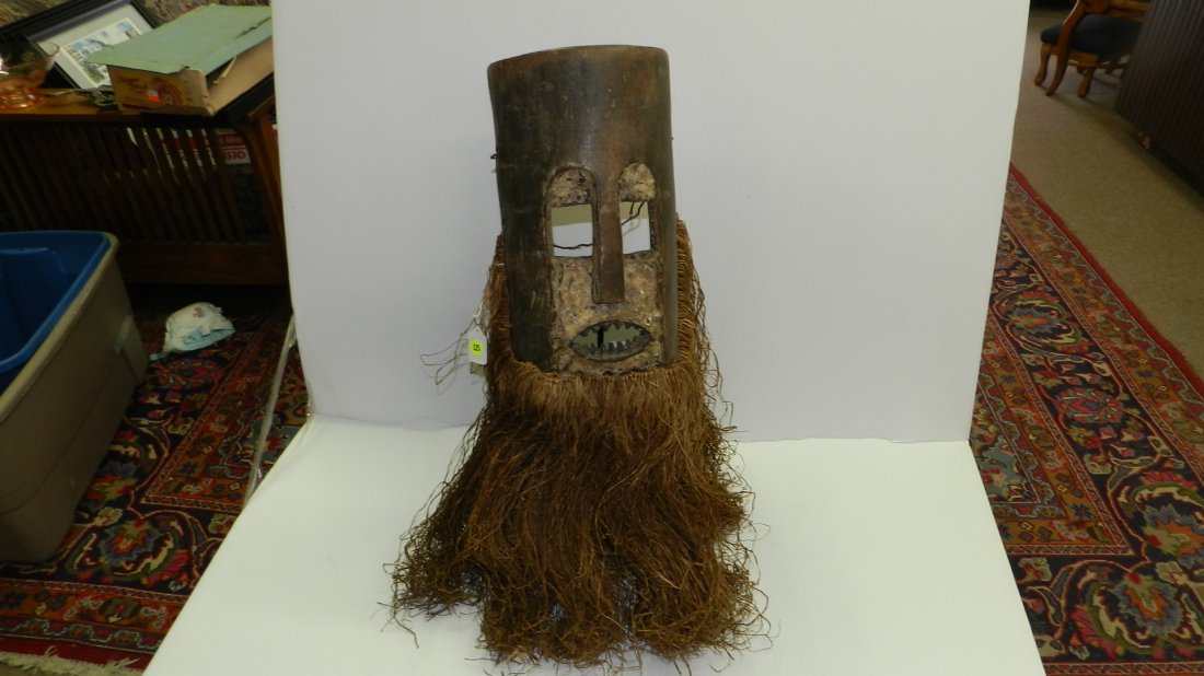1519) African hand carved mask with square eye holes: 1519) African hand carved mask with square eye holes and beard. cond G, 23 x 89