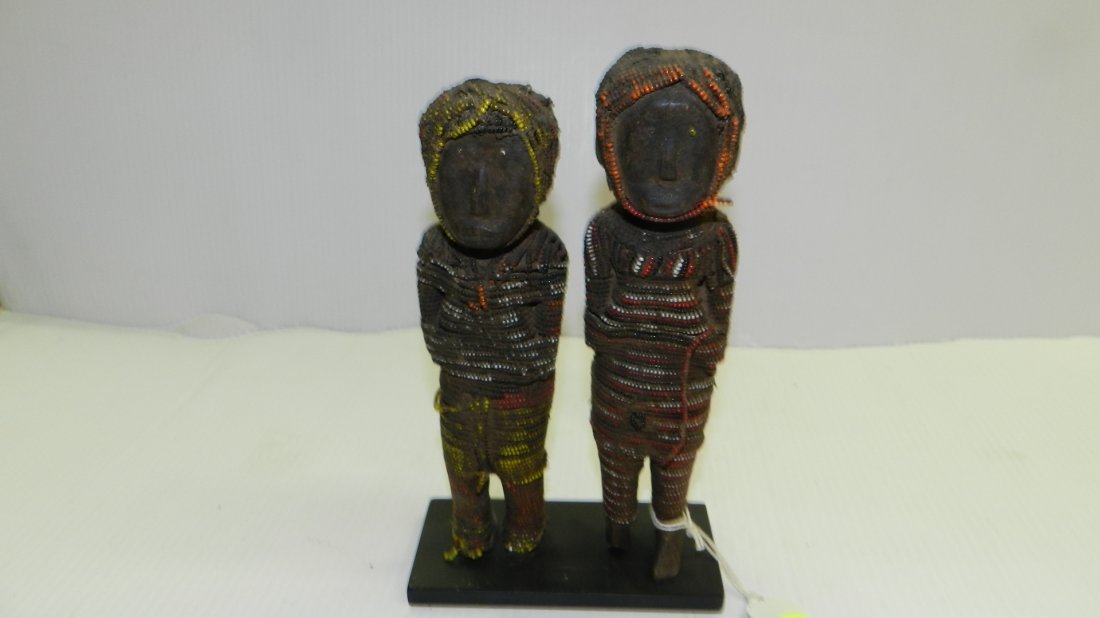 5157) 2 East Africa hand carved figures wrapped figures: 5157) 2 East Africa hand carved figures wrapped figures w/ beads, cond G, minor bead loss from age, 10 x 6