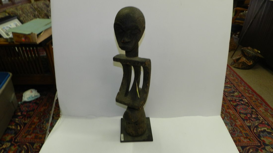 3184) African carved Figure or mask w/figure atop w/con: 3184) African carved Figure or mask w/figure atop w/concave chest area 28"