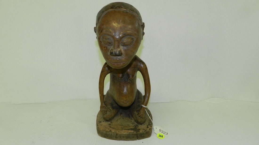 9323) nice African hand carved Kneeling female figure,: 9323) nice African hand carved Kneeling female figure, shows age splits, 12 1/2" tall
