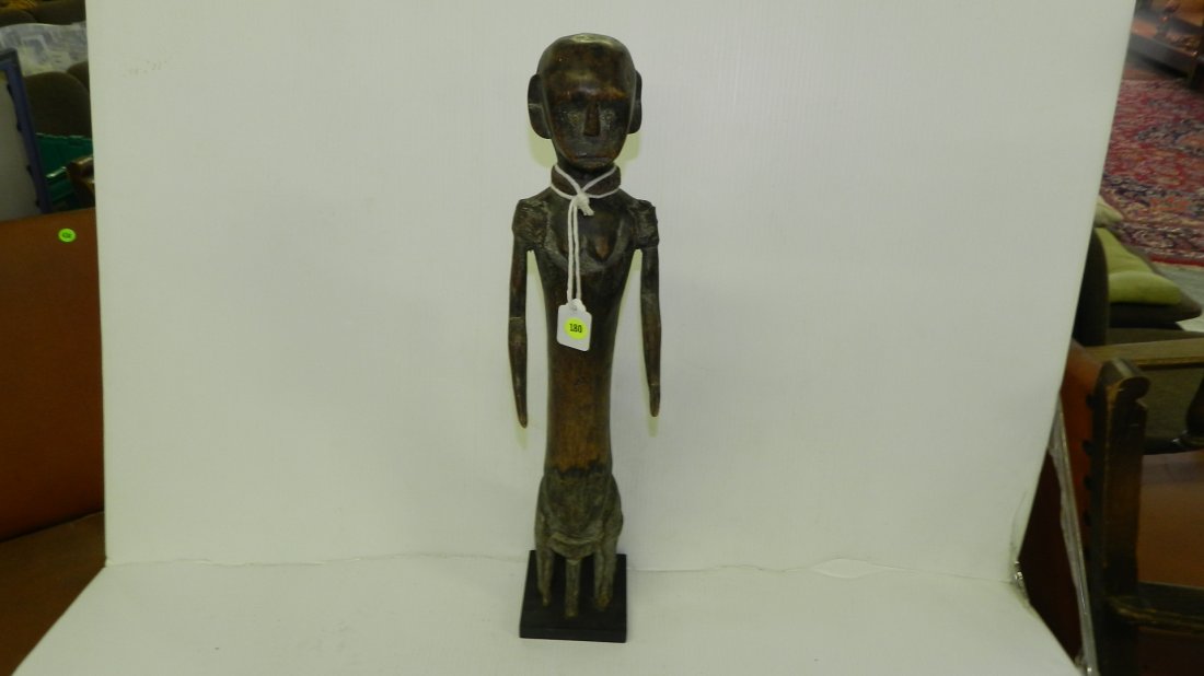 5172) African hand carved Nyamwezi figure sitting on st: 5172) African hand carved Nyamwezi figure sitting on stool. Right arm broken and repaired. 23"