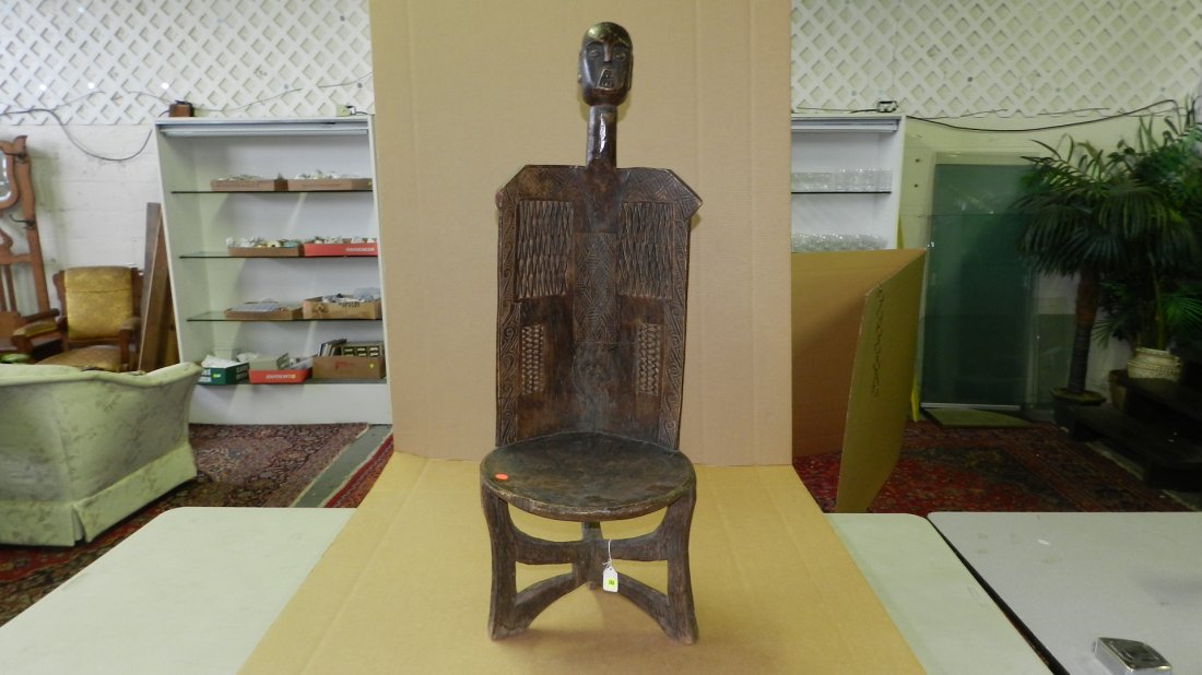 1190) African carved high backed chair - East African,: 1190) African carved high backed chair - East African, from Tanzania. 41 1/2 x 14 1/4 x 12