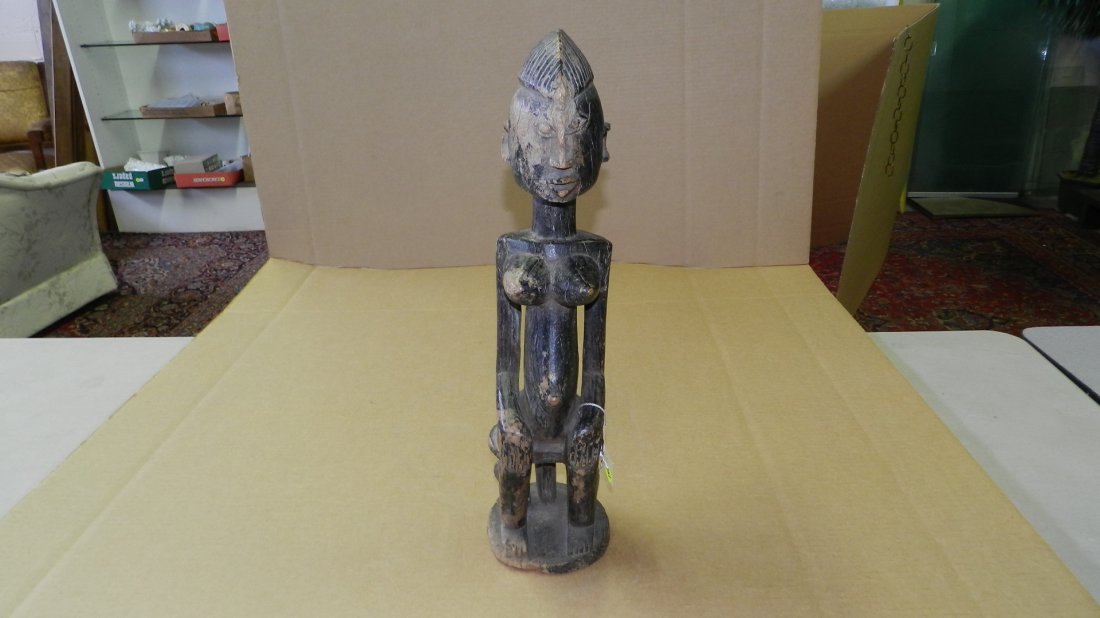 2365) African carved sitting female figure on stool. Fr: 2365) African carved sitting female figure on stool. From Mali. 20 1/2"