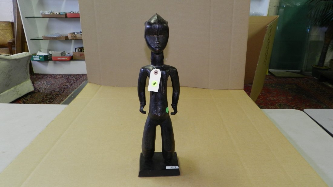 5622) African carved standing maternity figure, with ba: 5622) African carved standing maternity figure, with baby on back, on stand. 22" w/stand