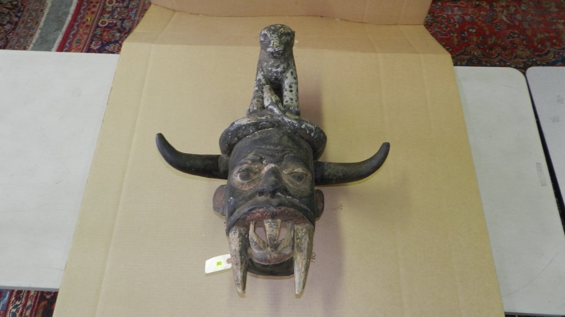 N14) African carved mask with leopard on top: N14) African carved mask with leopard on top 27 x 22 x 10 1/2