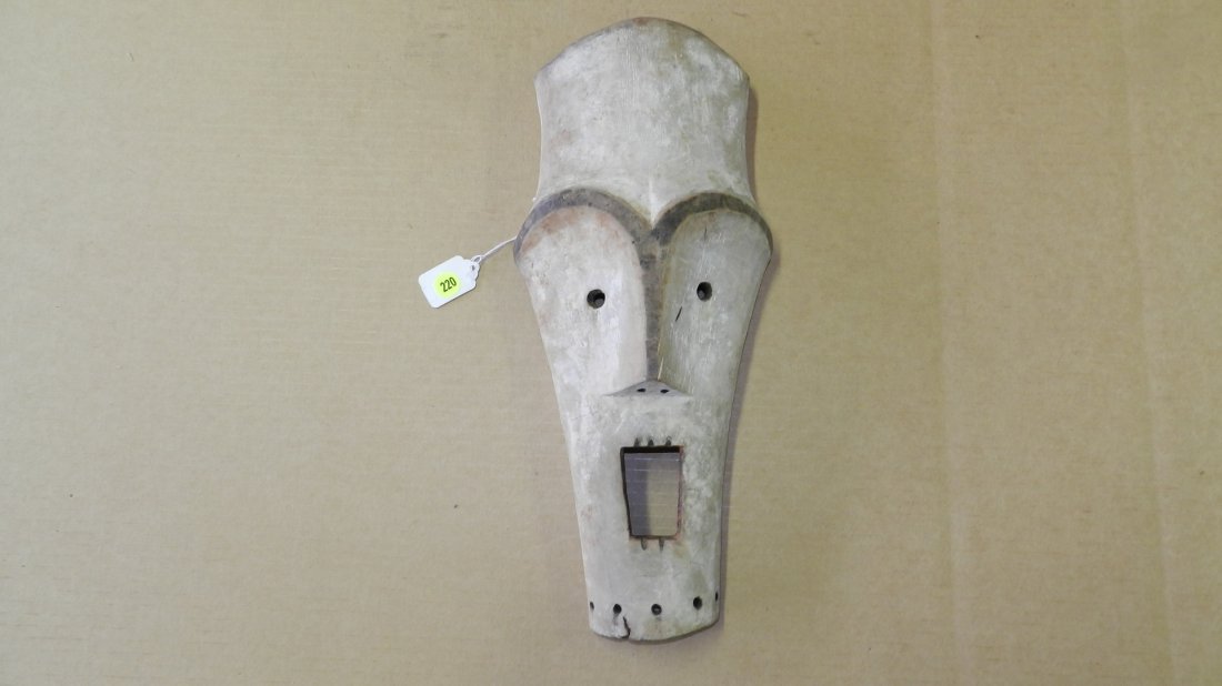 1565) African carved Lega maskette, from DR Congo. 17 x: 1565) African carved Lega maskette, from DR Congo. 17 x 8 2