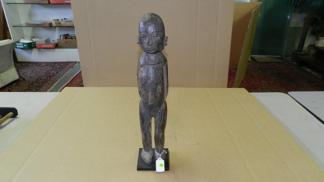 5218) African carved Lobi standing asexual figure, on s: 5218) African carved Lobi standing asexual figure, on stand, from Burkina Faso. 20"