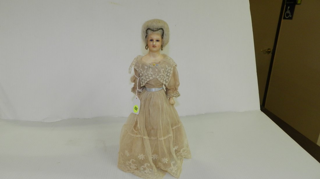 13) 15" French wax fashion doll, shoulder plate on: 13) 15" French wax fashion doll, shoulder plate on cloth body, wax arms and legs. Charming painted s