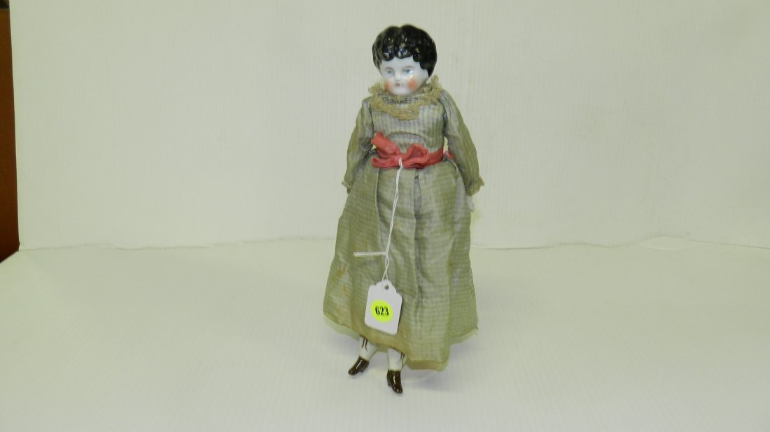 162) 12" China head doll with vintage dress.: 162) 12" China head doll with vintage dress.