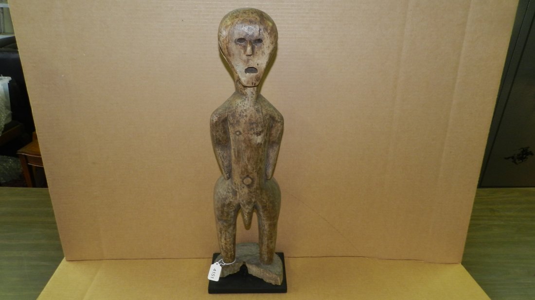 4151) East African carved standing male figure. 26 1/2": 4151) East African carved standing male figure. 26 1/2" w/stand