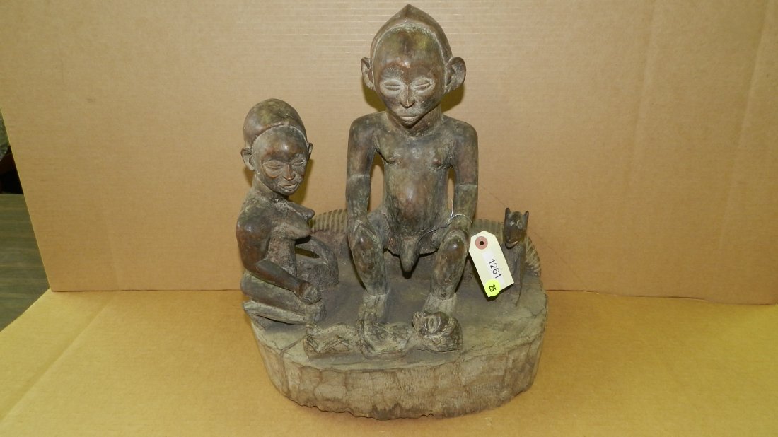 1261) African carved family scene figure on pedestal.: 1261) African carved family scene figure on pedestal. From DR Congo. 16 x 14 x 9