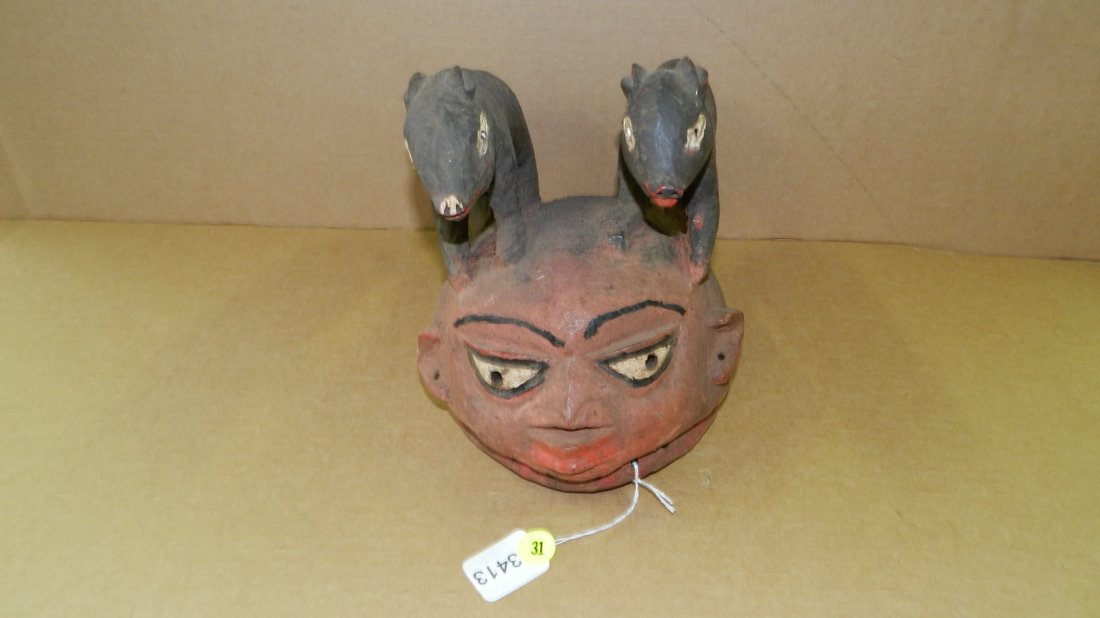 3413) African carved Yoruba mask w/two animal figures: 3413) African carved Yoruba mask w/two animal figures atop. From Nigeria. 8 x 7 x 10 1/2