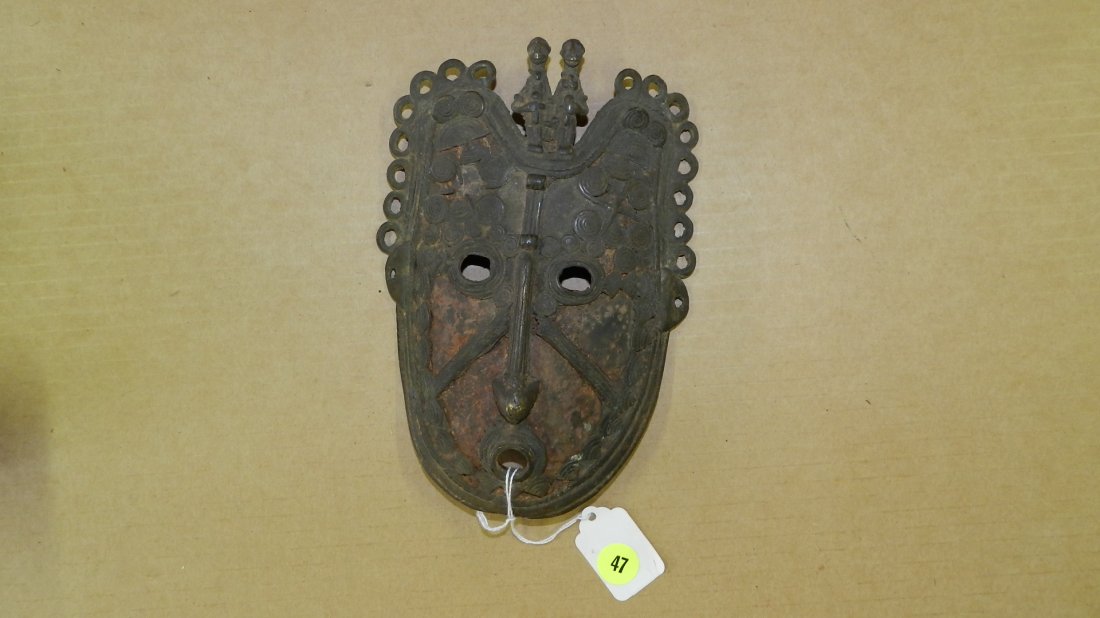 5318) African metal mask. 8 x 5 3/4: 5318) African metal mask. 8 x 5 3/4