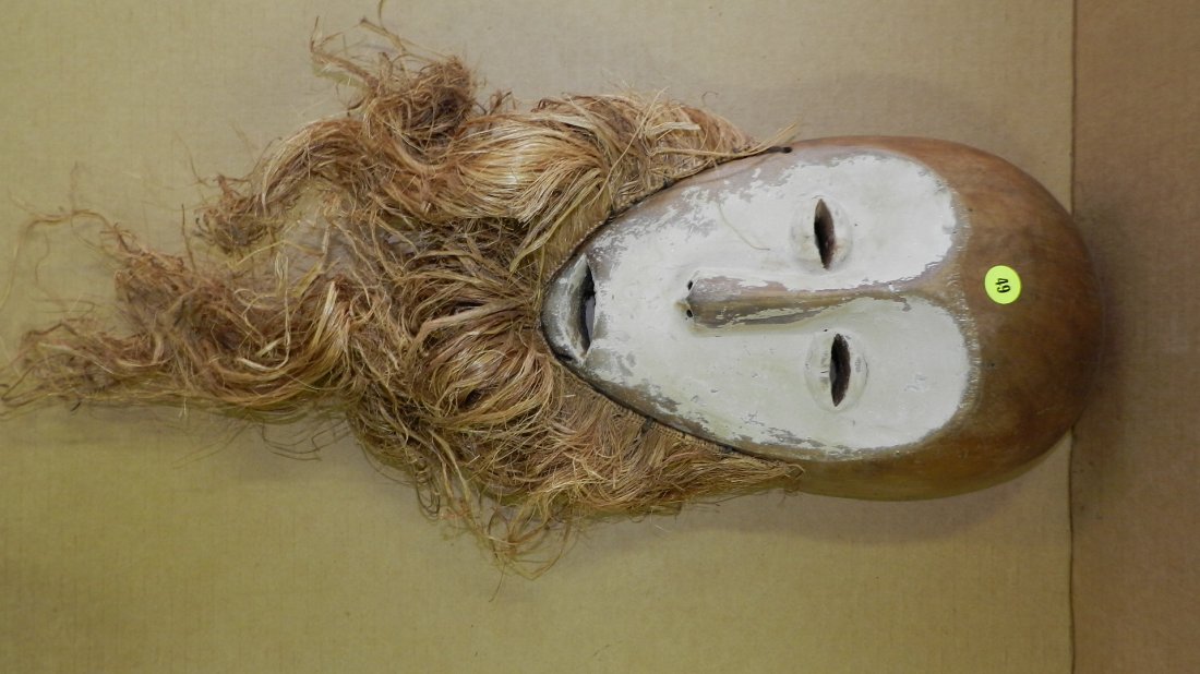 1548) African carved Lega mask, with white facial disc.: 1548) African carved Lega mask, with white facial disc. From DR Congo. 13 x 8 1/2 x 4 1/2. w/Raffia 25"