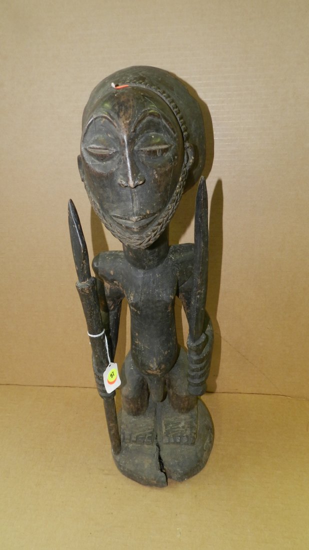 3376) African carved Male ancestor figure, with sword: 3376) African carved Male ancestor figure, with sword and spear, warrior chief, from DR Congo. 23"
