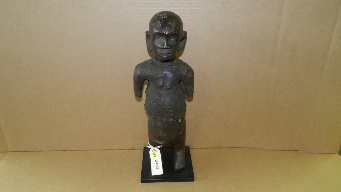 2452) East African carved standing asexual figure. 17": 2452) East African carved standing asexual figure. 17"