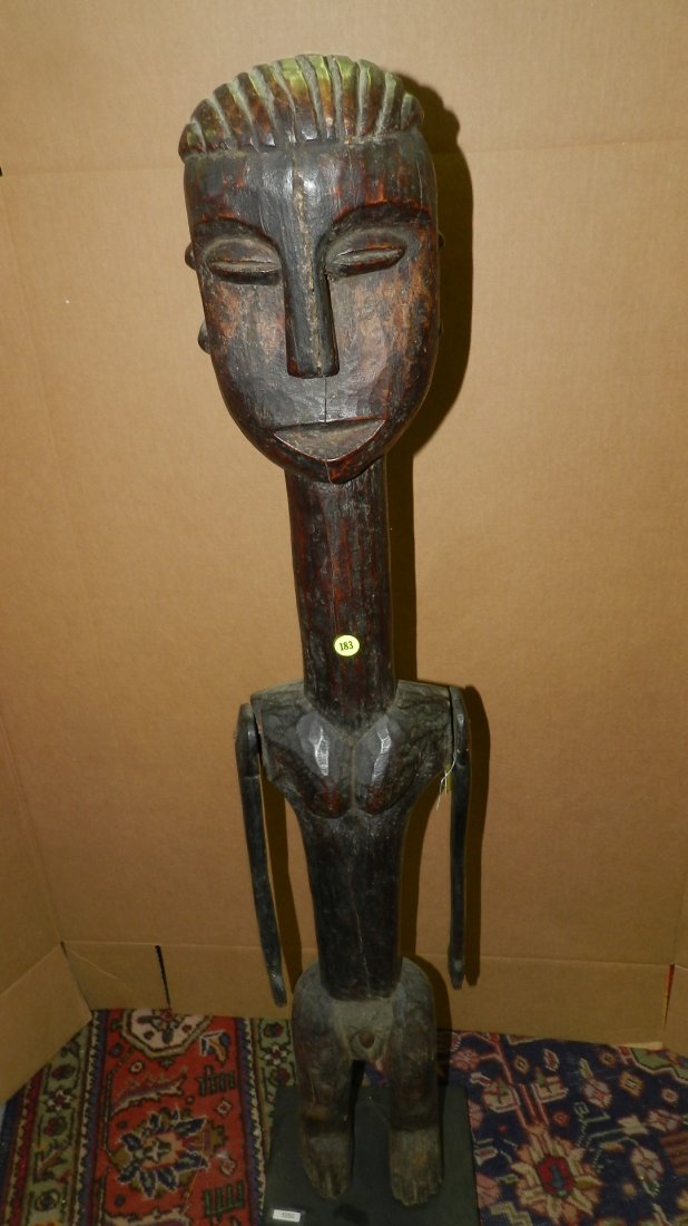 1050) large carved East African female figure on stand: 1050) large carved East African female figure on stand 46" with stand from the Sambaa tribe of Tanzania SSR