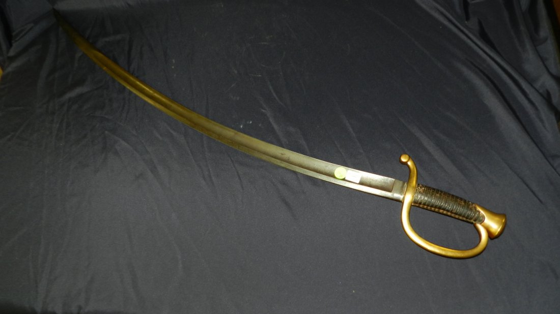 original Civil War Cavalry saber / sword by Ames, cond: original Civil War Cavalry saber / sword by Ames, cond VG, overall 37\", blade 32\" still has original hand grip, blade marked U.S. L.D. 1862