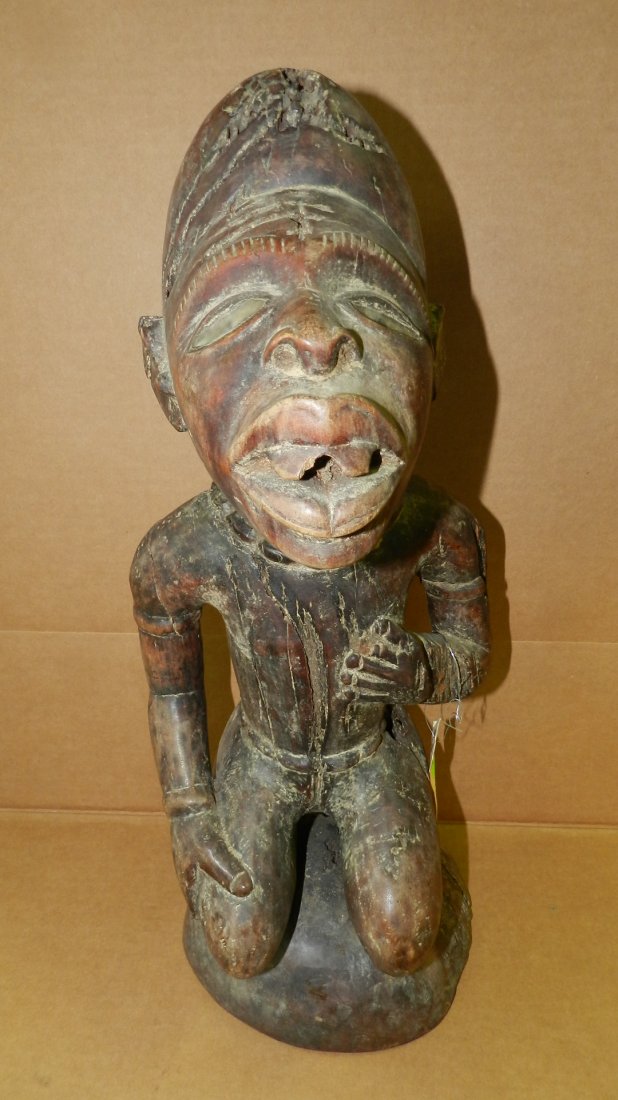 1283) African carved asexual figure kneeling on a dome,: 1283) African carved asexual figure kneeling on a dome, blackened wood with paint, from DR CONGO. 19