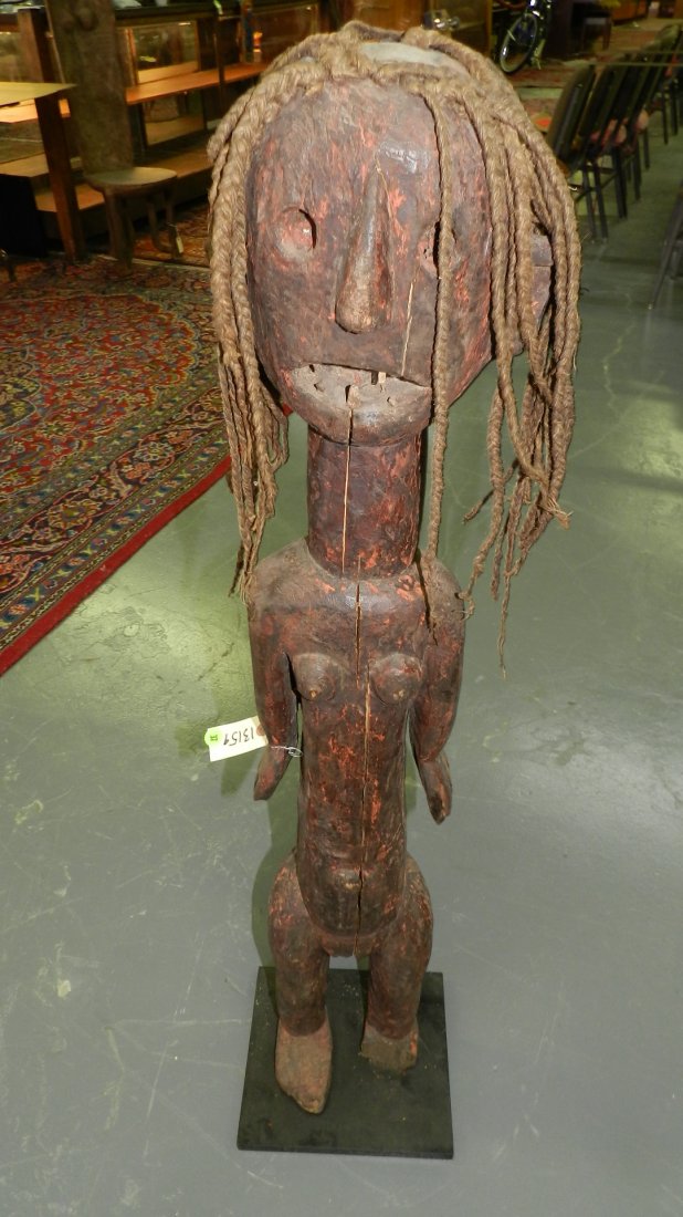 13159) East African carved female standing figure. 45": 13159) East African carved female standing figure. 45" Shipping Alert * this item is larger than what our shippers can handle, we can still offer to ship this item to you with our "In-house" shipping,