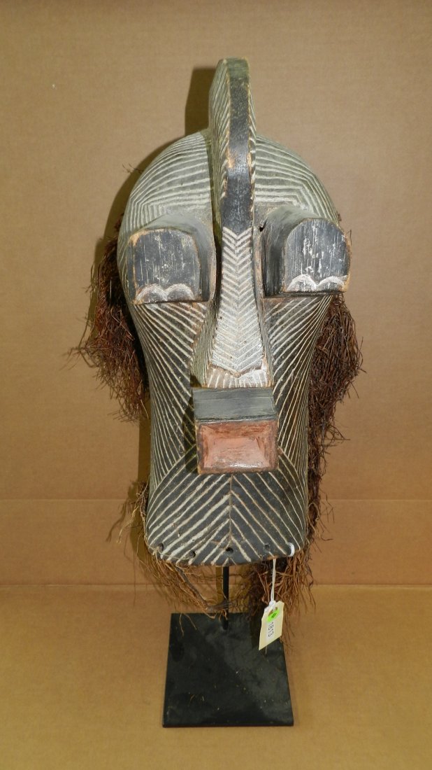 1813) African carved Songye mask, from DR Congo. 19 x 7: 1813) African carved Songye mask, from DR Congo. 19 x 7 x 8, w/stand 28 1/2"